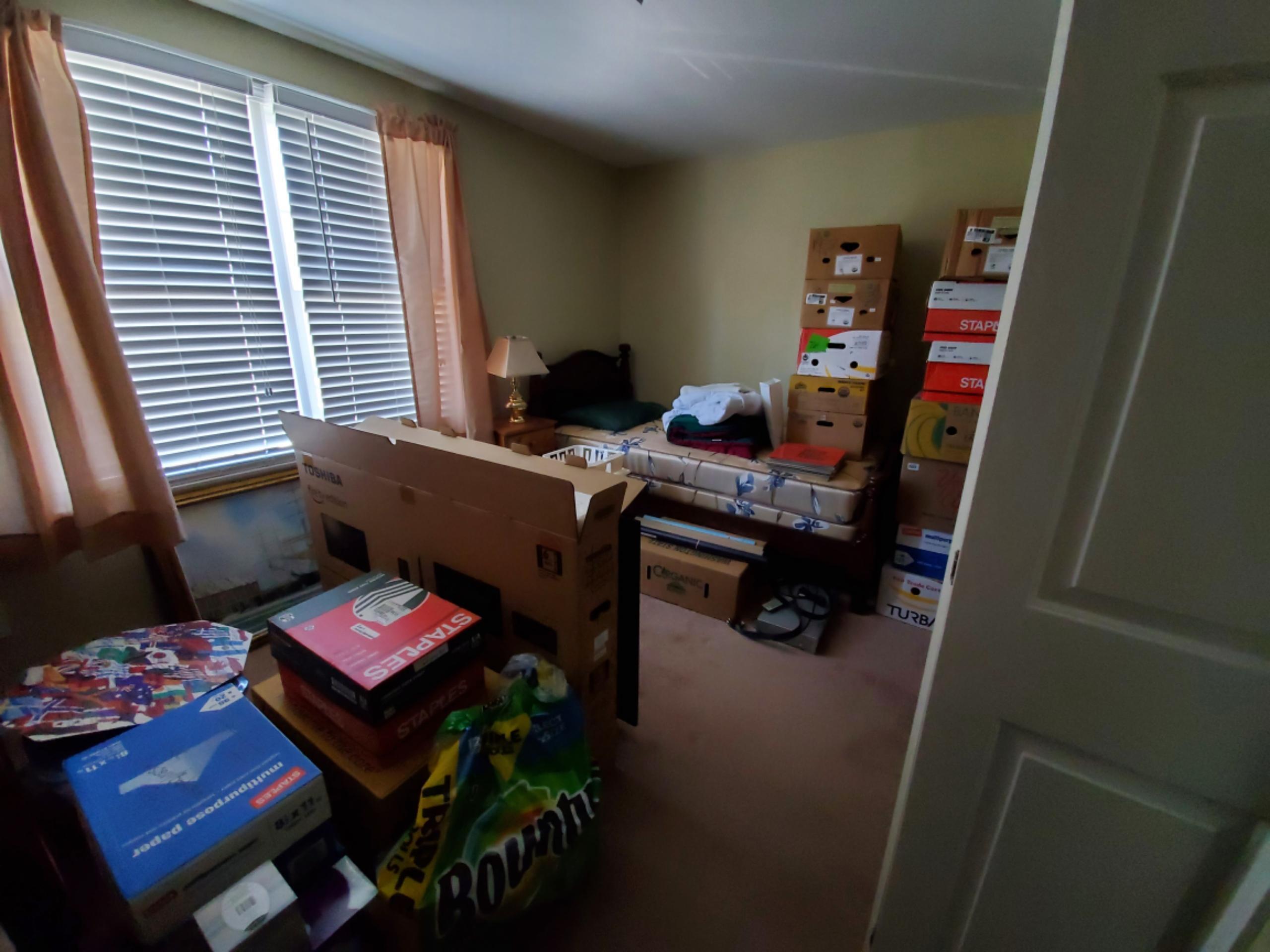 250-252 Underpass Road Brewster, MA 02631 - Photo 14 of 30 a view of a workspace with furniture and a window