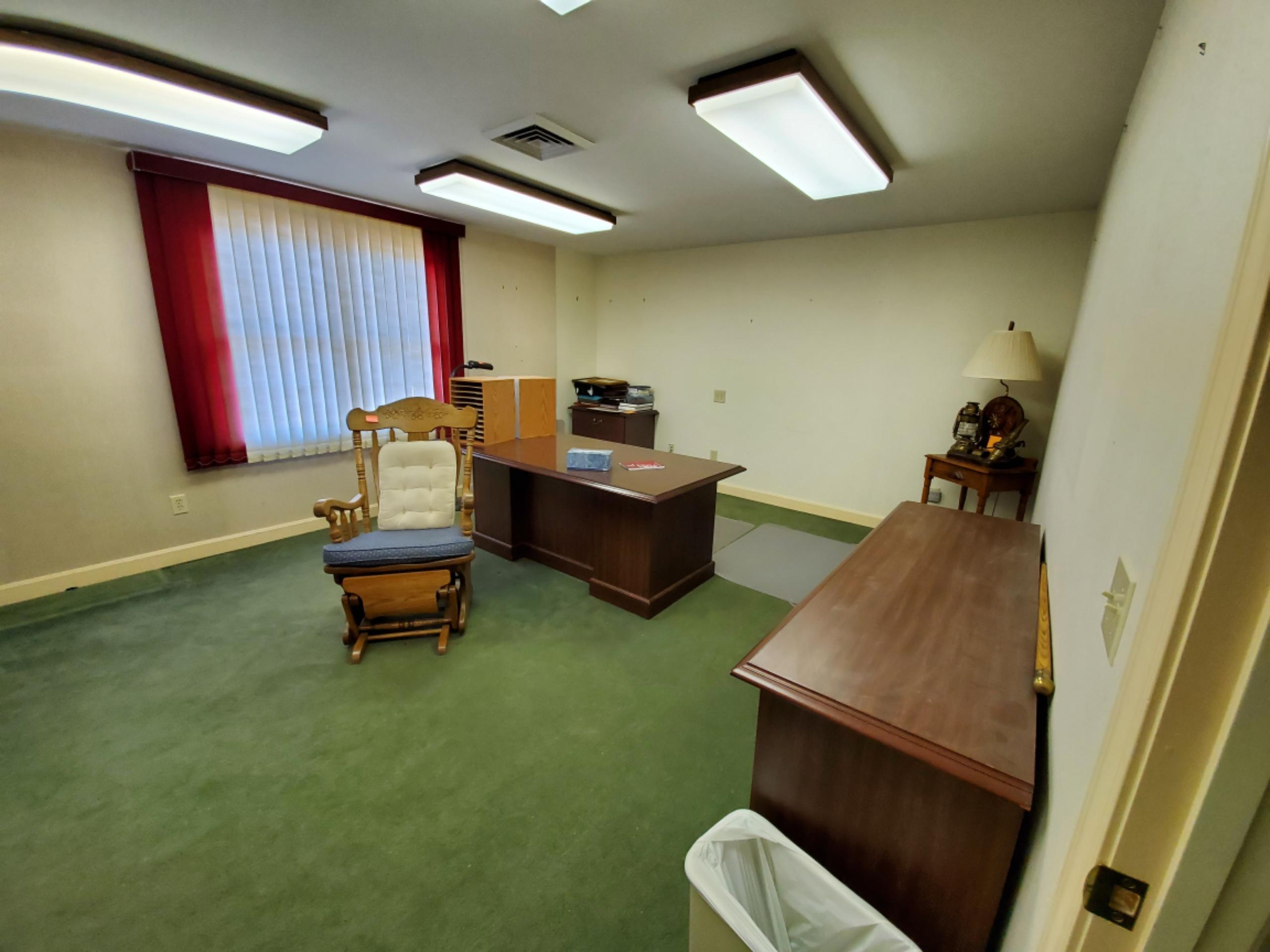 250-252 Underpass Road Brewster, MA 02631 - Photo 20 of 30 a room with furniture and a window