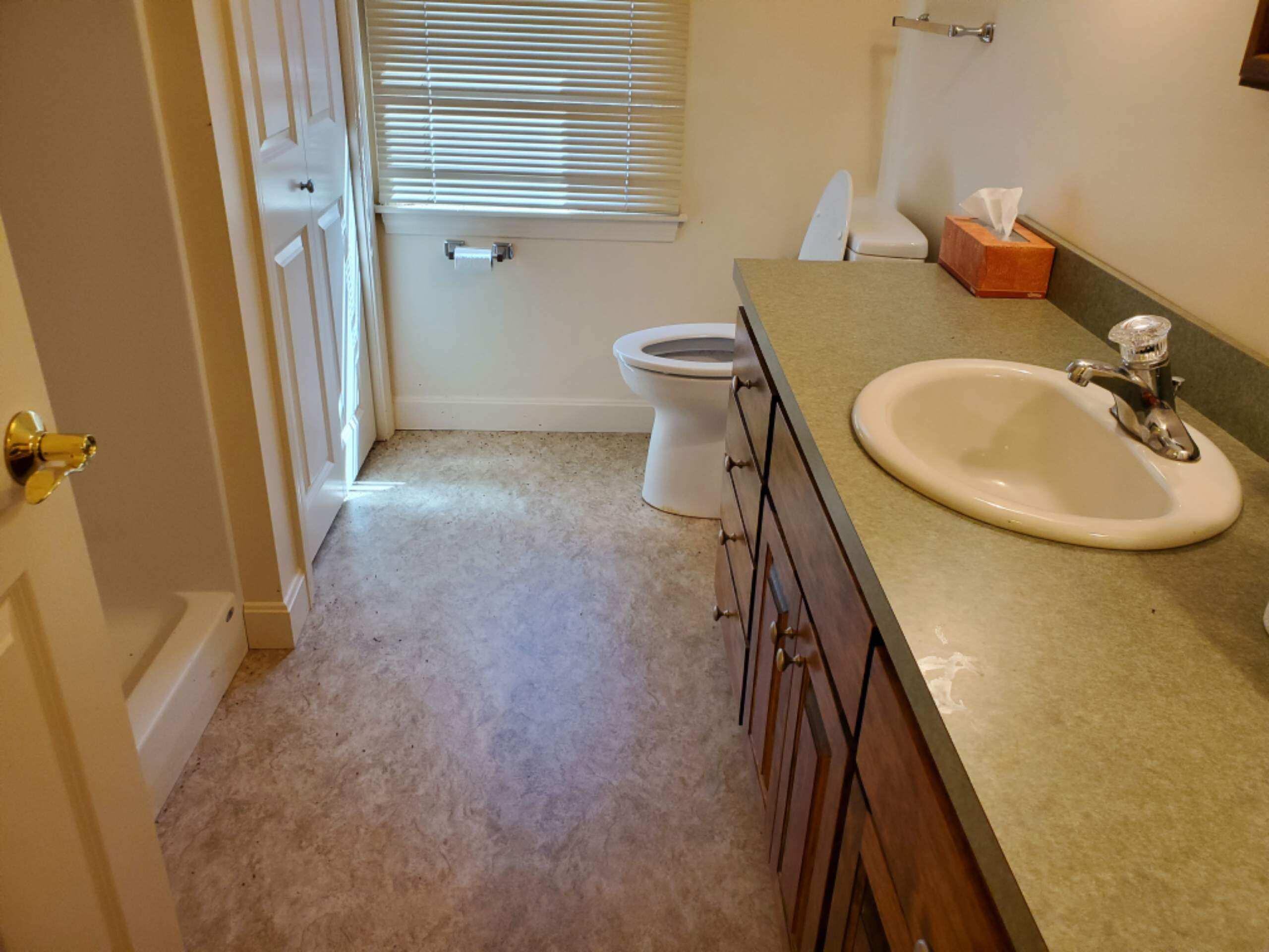 250-252 Underpass Road Brewster, MA 02631 - Photo 29 of 30 a bathroom with sink and mirror