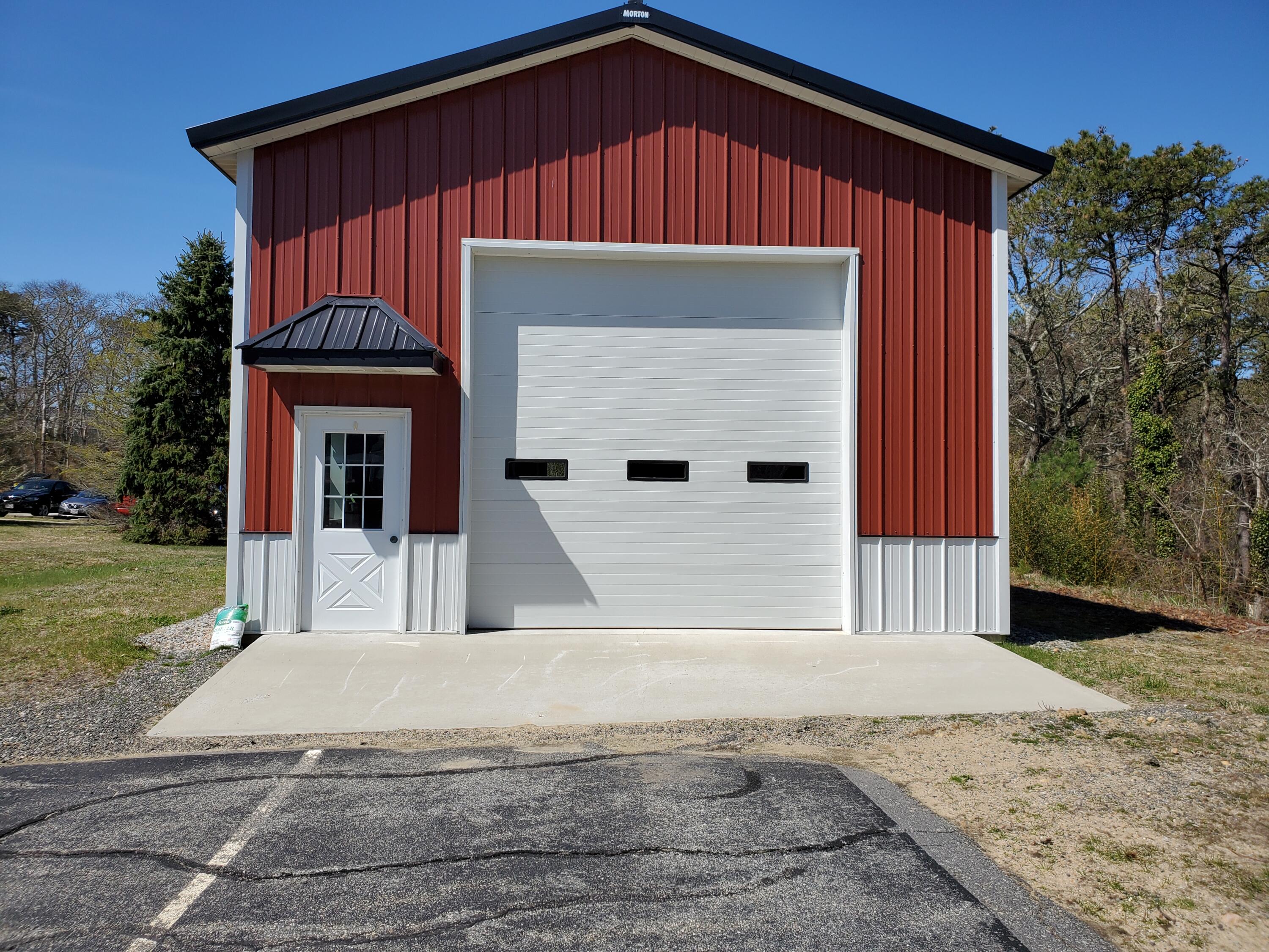 250-252 Underpass Road Brewster, MA 02631 - Photo 6 of 30 a front view of a house with garden