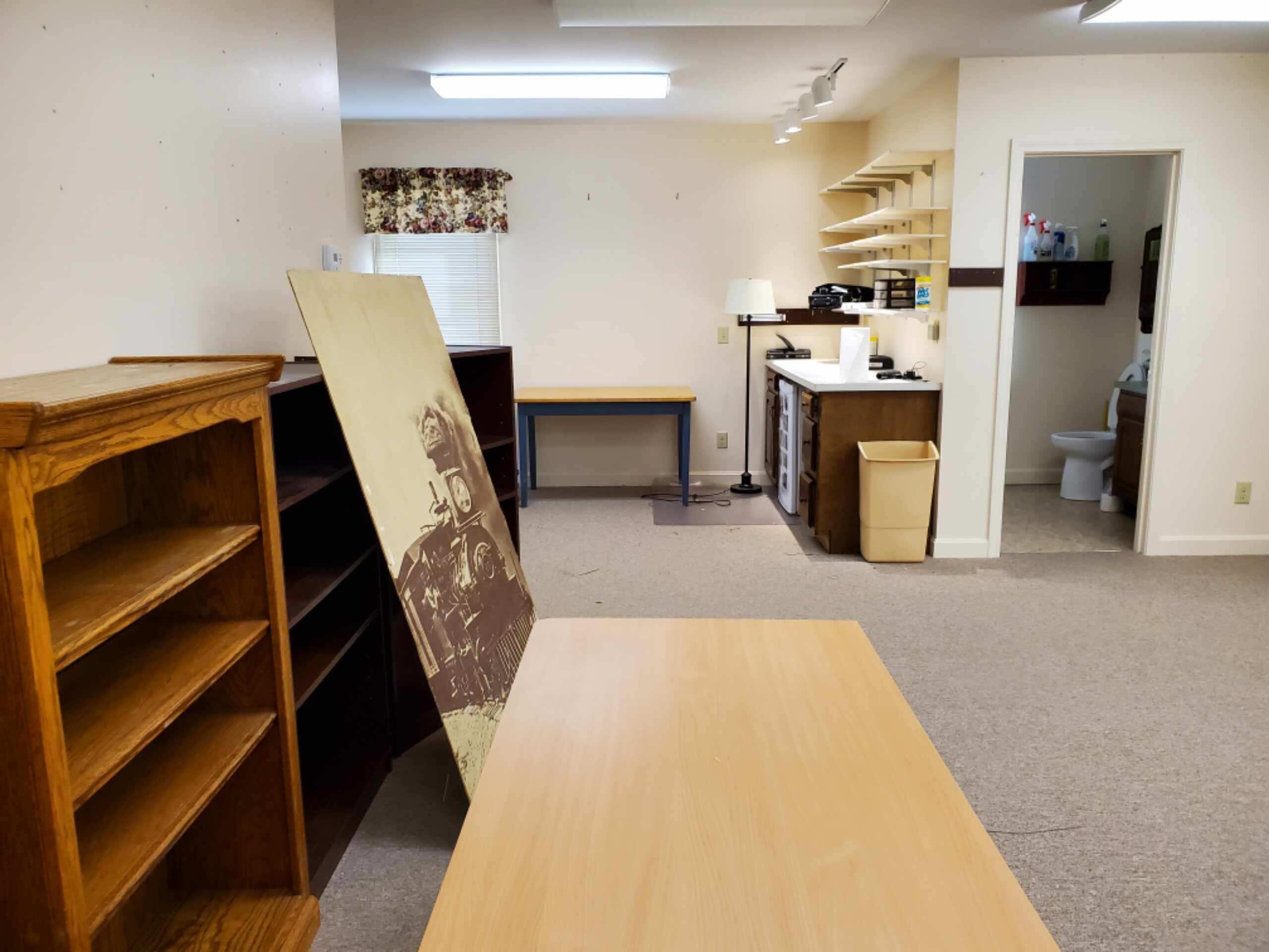 250-252 Underpass Road Brewster, MA 02631 - Photo 8 of 30 a view of a kitchen with fridge and workspace