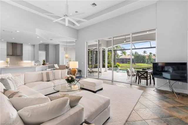 a kitchen with a sink appliances and cabinets
