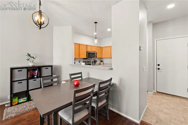a view of a dining room with furniture