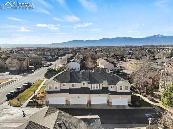 a view of a city with an ocean