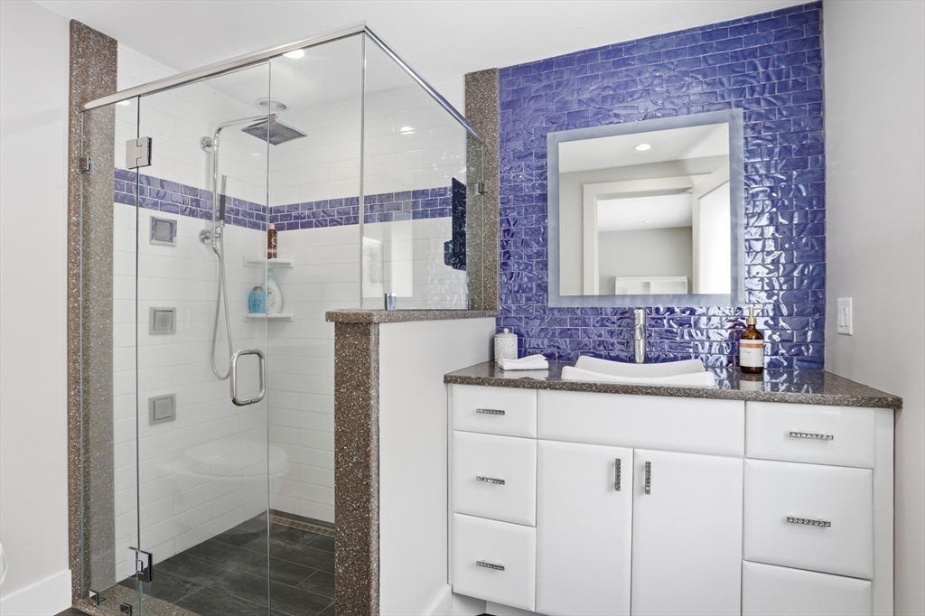 235 Kemp Street Dunstable, MA 01827 - Photo 26 of 42 a bathroom with a granite countertop sink mirror and shower
