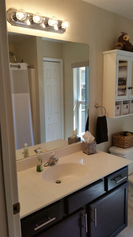 174 Southwest Sea Lion Road Port St. Lucie, FL 34953 - Photo 25 of 31 a view of a dining room with a table and chairs