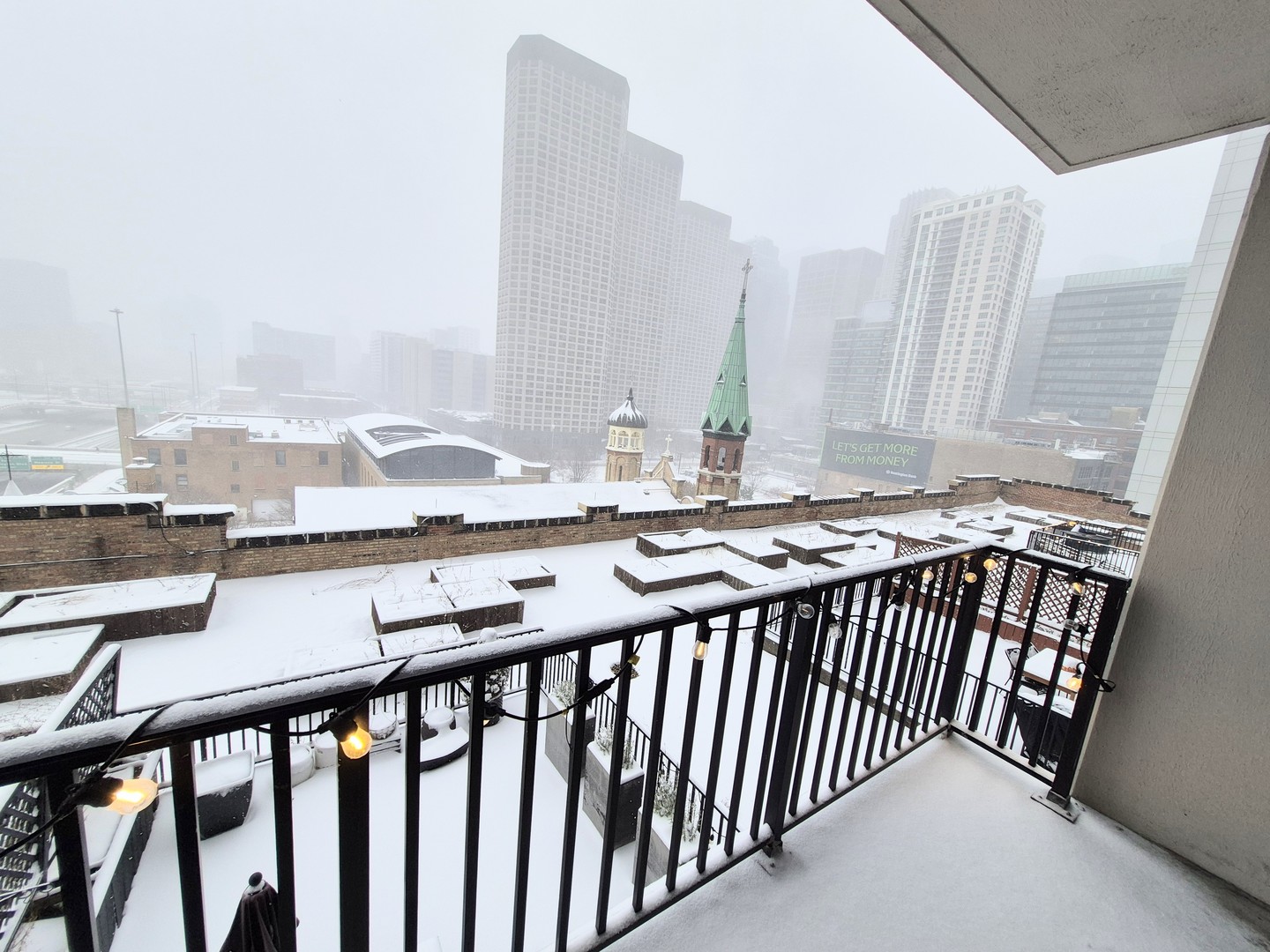 210 South Desplaines Street, Unit 707 Chicago, IL 60661 - Photo 18 of 21 a view of balcony with a sink and wooden floor
