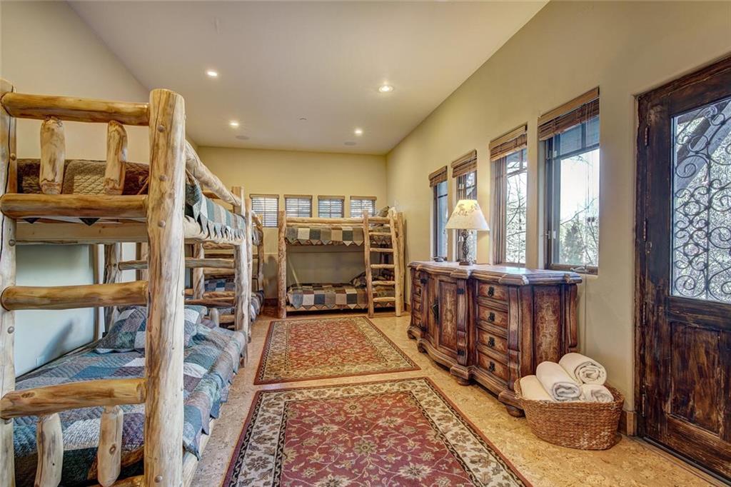 1065 4 O Clock Road Breckenridge, CO 80424 - Photo 11 of 35 a living room with furniture windows and a wooden floor