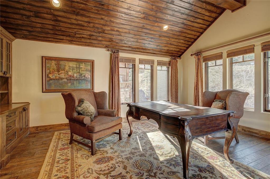 1065 4 O Clock Road Breckenridge, CO 80424 - Photo 14 of 35 a living room with furniture and a large window