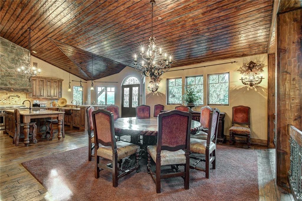 1065 4 O Clock Road Breckenridge, CO 80424 - Photo 4 of 35 a view of a dining room with furniture window and outside view