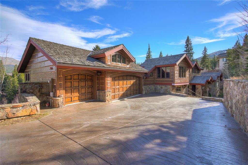 1065 4 O Clock Road Breckenridge, CO 80424 - Photo 32 of 35 a front view of a house with a yard