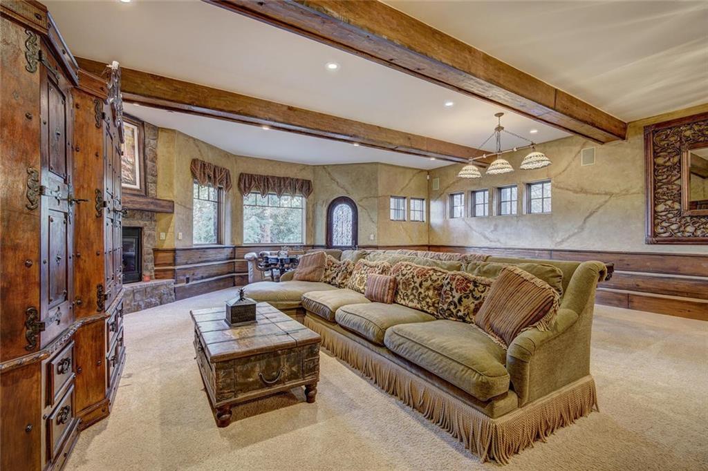 1065 4 O Clock Road Breckenridge, CO 80424 - Photo 9 of 35 a living room with furniture and a large window