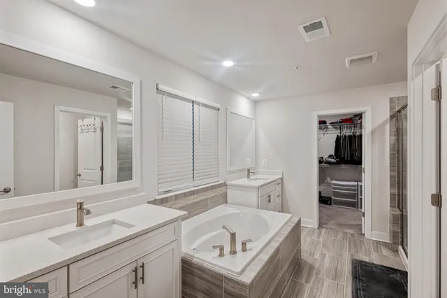 a bathroom with a sink and a bathtub