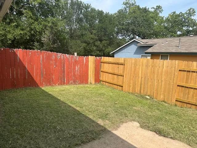a view of backyard with green space
