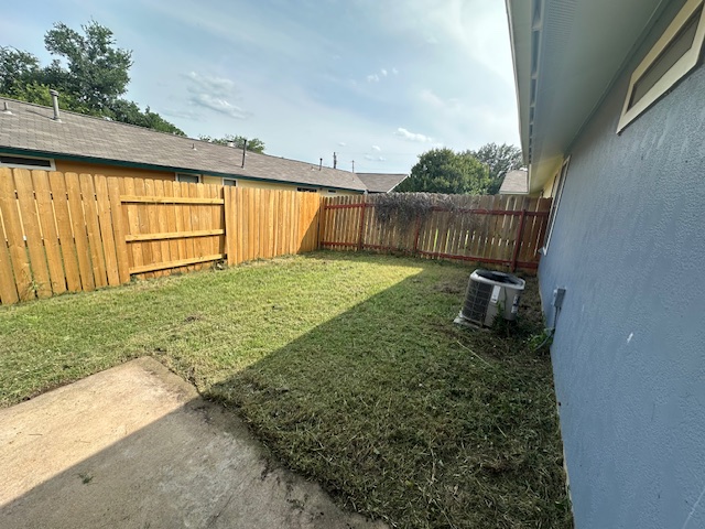 3603 Buffalo Springs Trail, Unit B Georgetown, TX 78628 - Photo 13 of 16 a view of a backyard with wooden fence