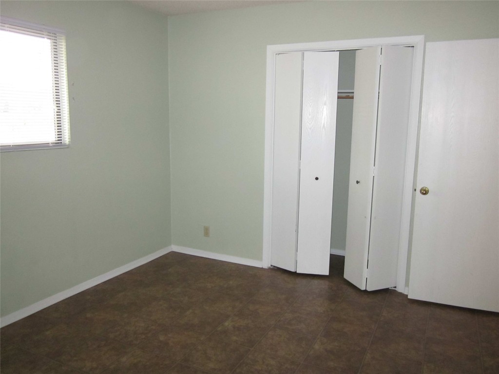 3603 Buffalo Springs Trail, Unit B Georgetown, TX 78628 - Photo 8 of 16 an empty room with windows