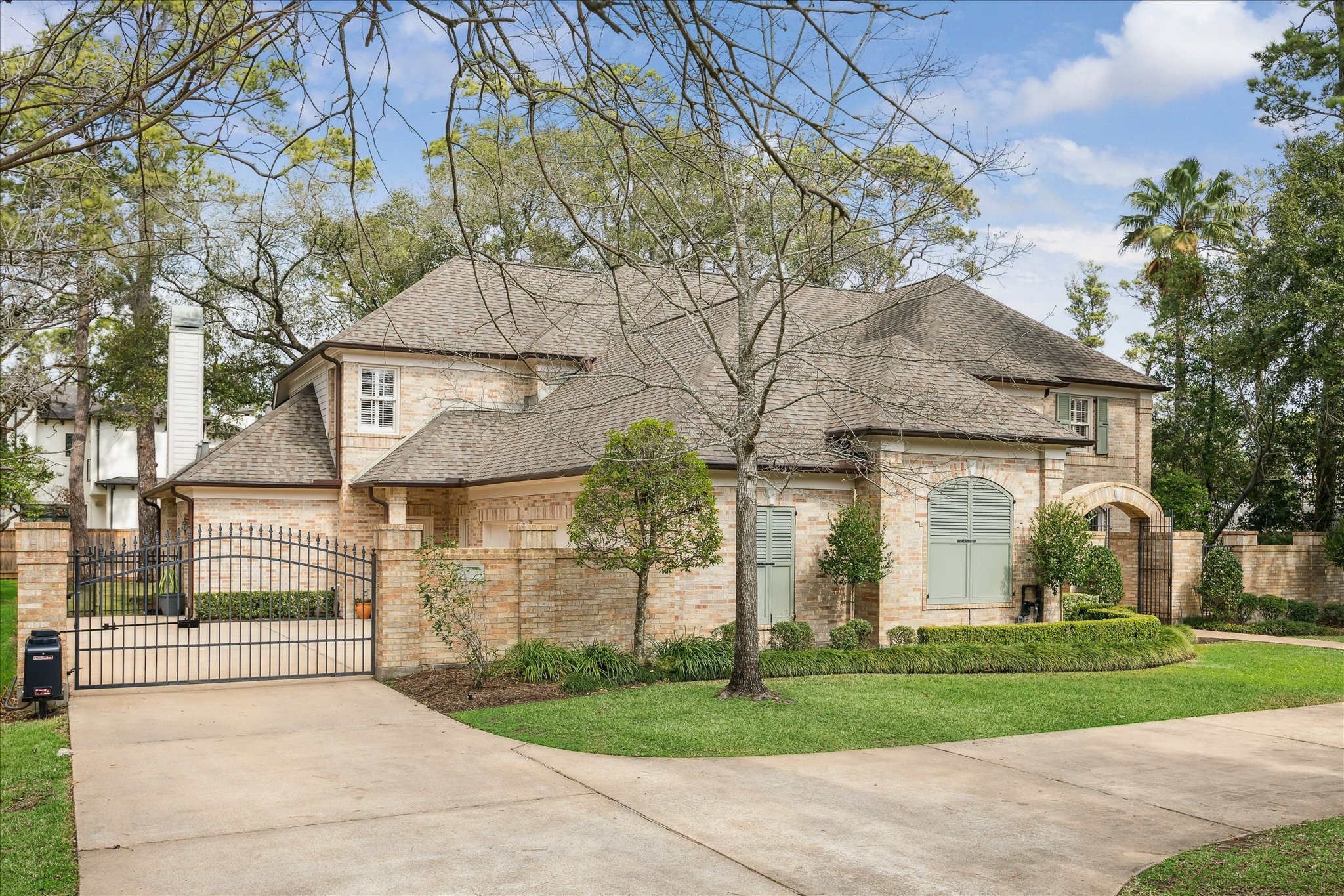 11524 Taylorcrest Road Houston, TX 77024 - Photo 45 of 47 The property offers abundant parking opportunities with an expansive circular drive creating an impressive arrival, complemented by a gated motor court, and a three-car garage.
