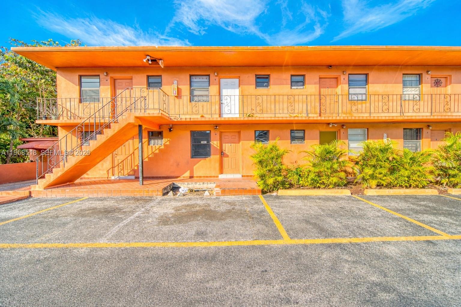 a view of a building with a street