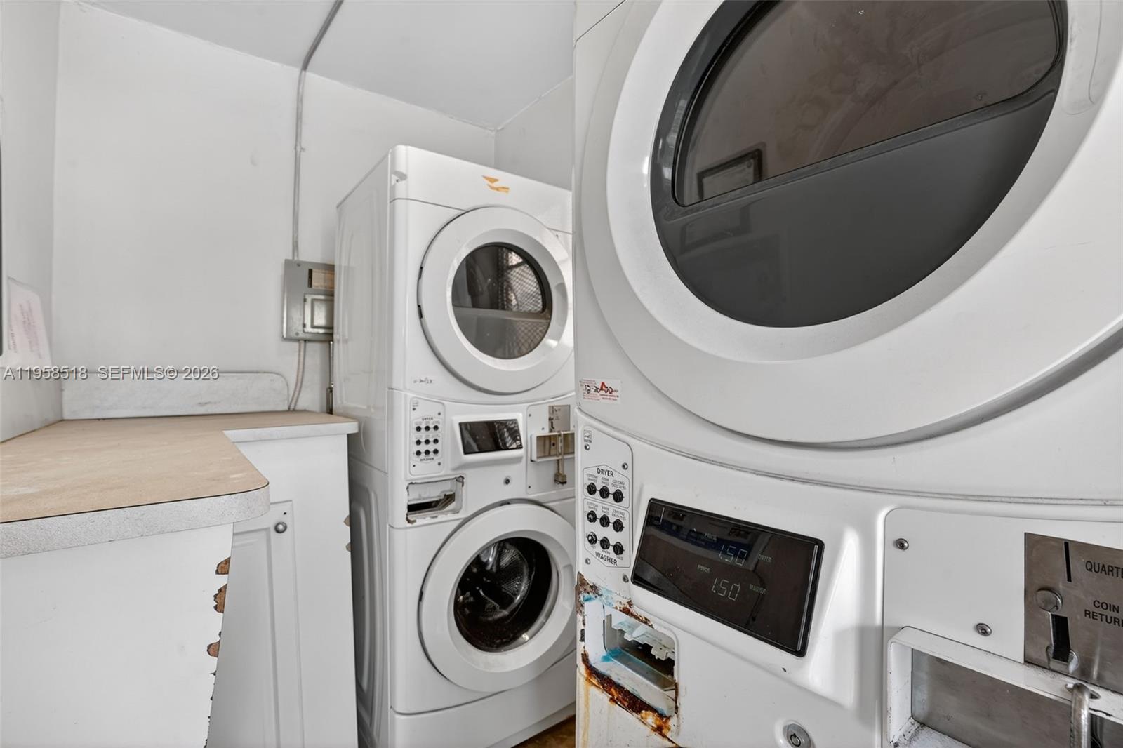 1716 Northwest 19th Street Miami, FL 33125 - Photo 15 of 20 a utility room with dryer and washer