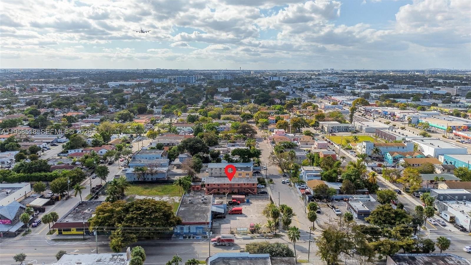 1716 Northwest 19th Street Miami, FL 33125 - Photo 17 of 20 an aerial view of multiple house