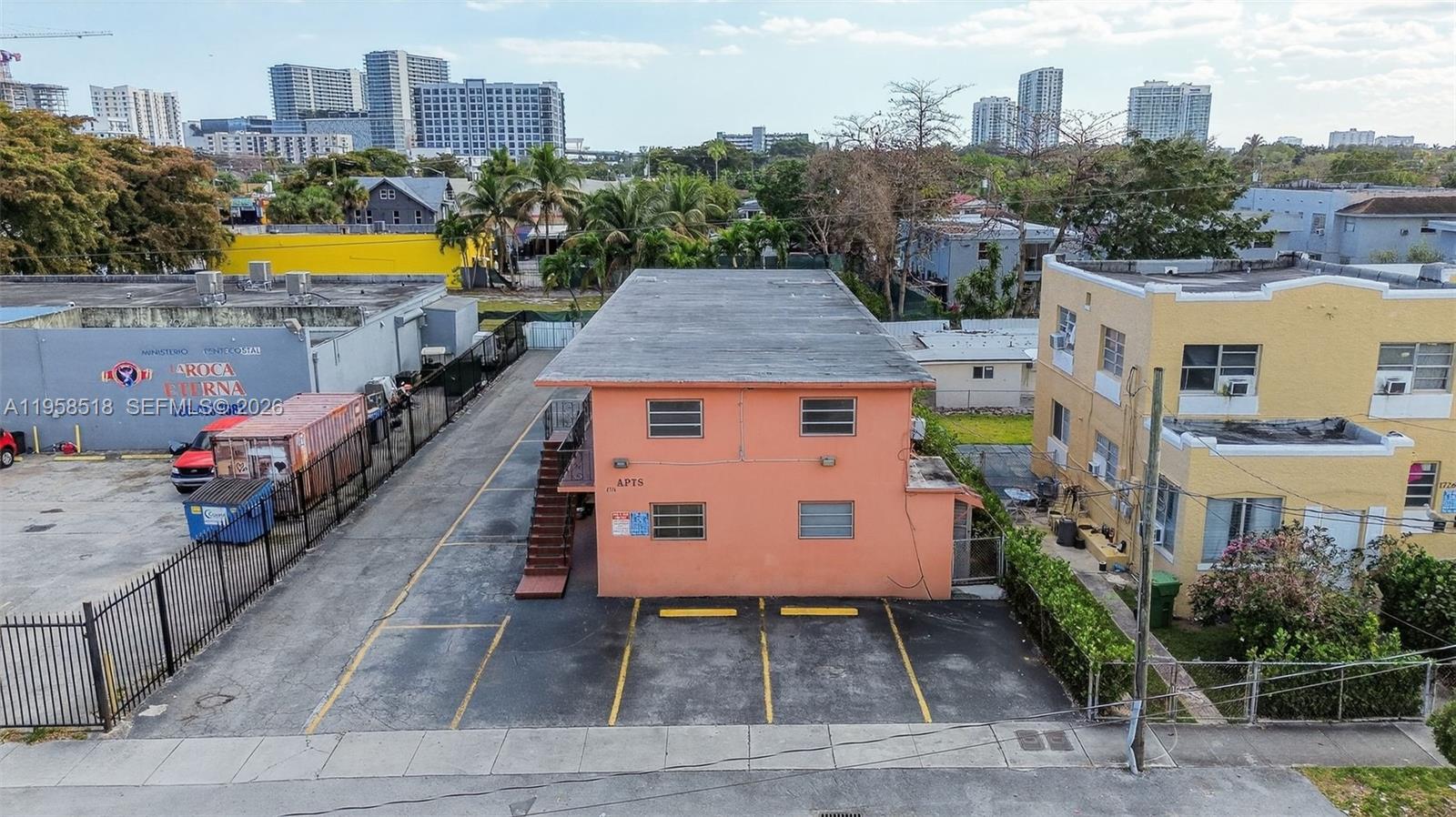 1716 Northwest 19th Street Miami, FL 33125 - Photo 2 of 20 a aerial view of multiple houses with yard