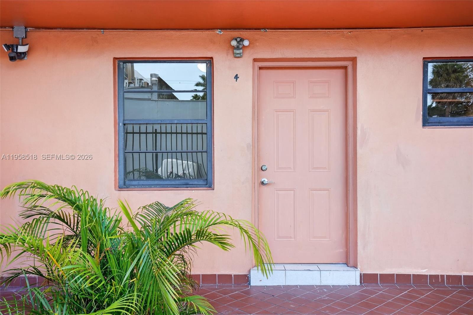 1716 Northwest 19th Street Miami, FL 33125 - Photo 4 of 20 a view of front door