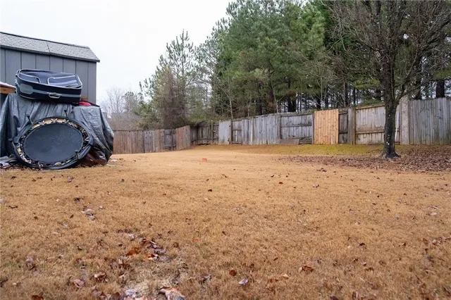 a view of a backyard of a house