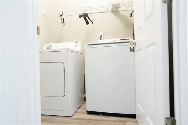a utility room with dryer and washer