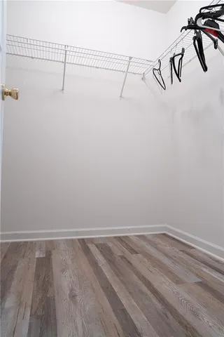 a view of a room with racks on the wall