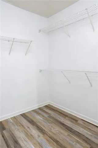 a view of a room with racks on the wall