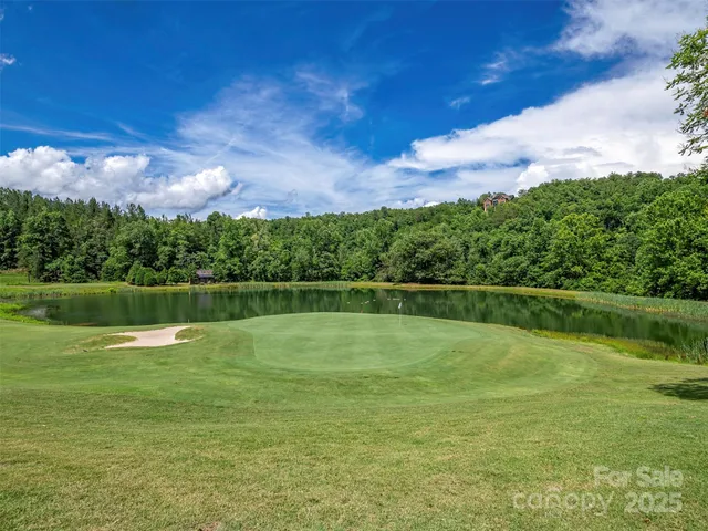 a view of a golf course with a lake