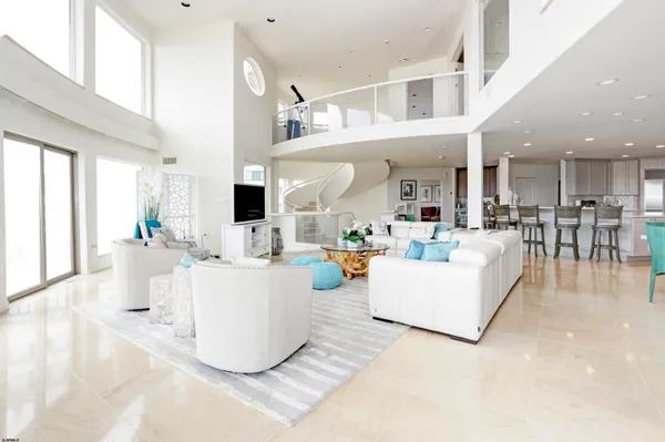 a view of a swimming pool with a lounge chair