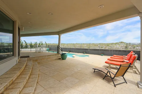 an aerial view of a house with a ocean view