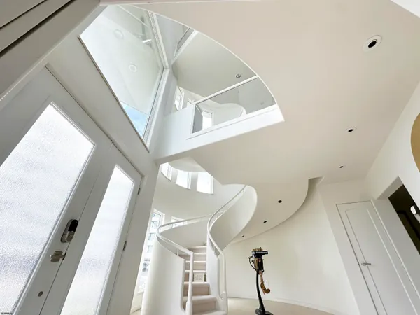 view of living room with furniture and floor to ceiling windows