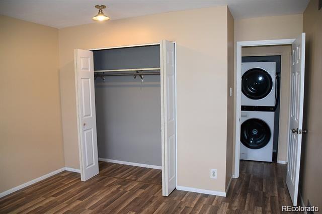 1225 South Oneida Street, Unit 252 Denver, CO 80224 - Photo 15 of 20 a view of a storage and utility room with washer and dryer