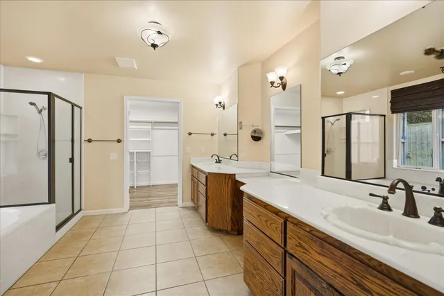 a bathroom with a bathtub and a window