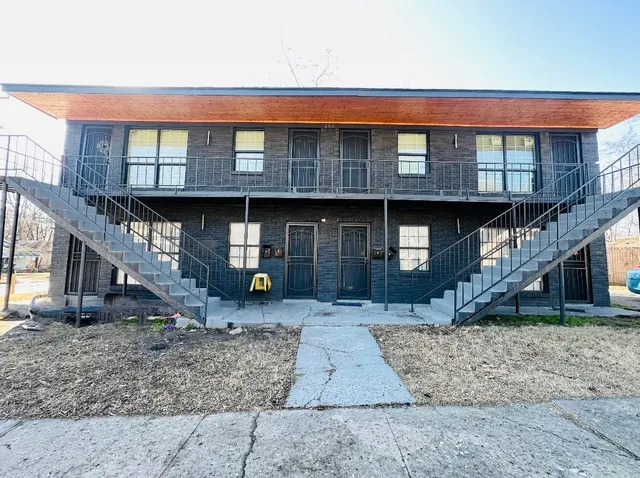 a front view of a house with garage