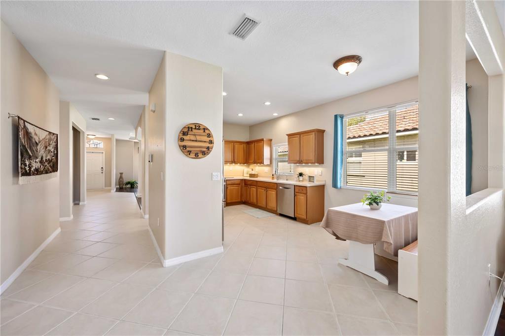 8769 Monterey Bay Loop Bradenton, FL 34212 - Photo 17 of 64 a open kitchen with cabinets and stainless steel appliances