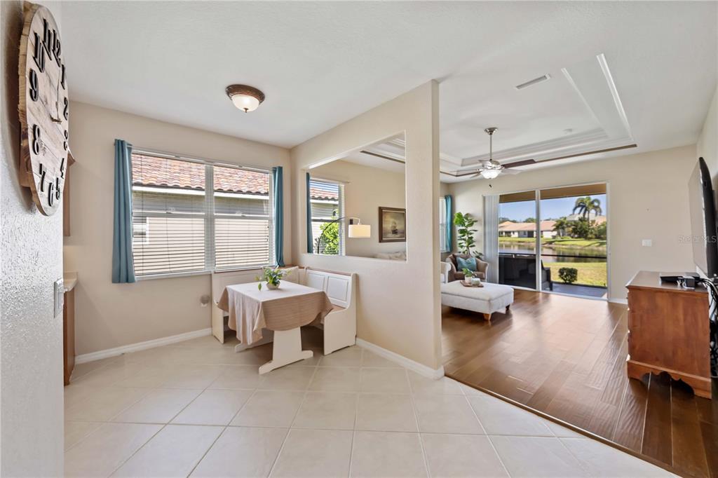 8769 Monterey Bay Loop Bradenton, FL 34212 - Photo 19 of 64 a living room with furniture and large windows