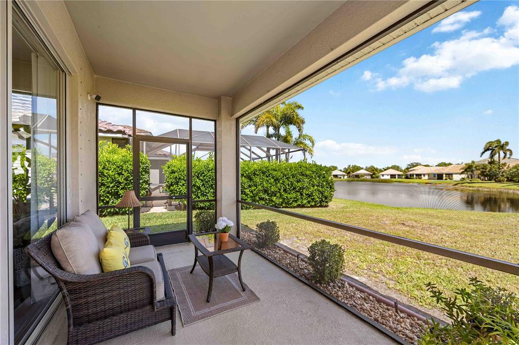 8769 Monterey Bay Loop Bradenton, FL 34212 - Photo 3 of 64 a balcony with furniture and garden view