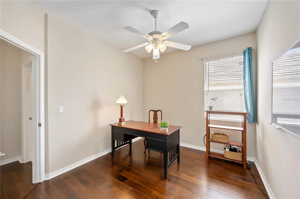 8769 Monterey Bay Loop Bradenton, FL 34212 - Photo 36 of 64 a view of a workspace with furniture and a window