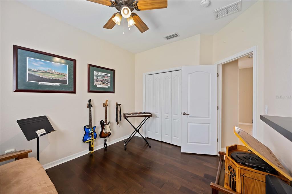 8769 Monterey Bay Loop Bradenton, FL 34212 - Photo 39 of 64 a view of a workspace with furniture and wooden floor