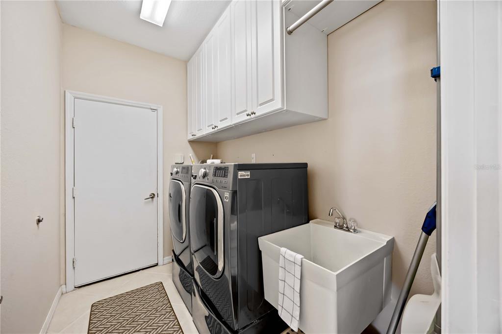 8769 Monterey Bay Loop Bradenton, FL 34212 - Photo 40 of 64 a utility room with dryer and washer