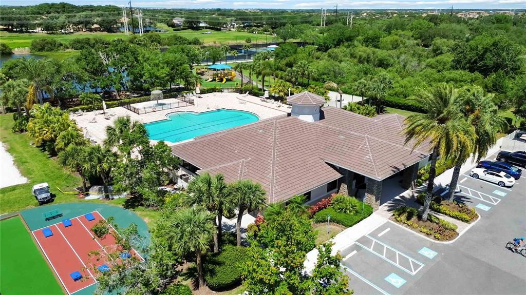 8769 Monterey Bay Loop Bradenton, FL 34212 - Photo 48 of 64 an aerial view of a house with yard swimming pool and outdoor seating
