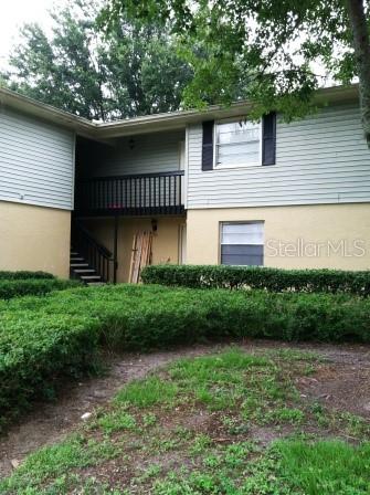 207 Thorntree Place, Unit 207 Brandon, FL 33510 - Photo 1 of 1 a front view of a house with garden