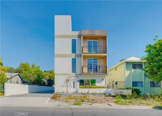 a front view of a building with street view