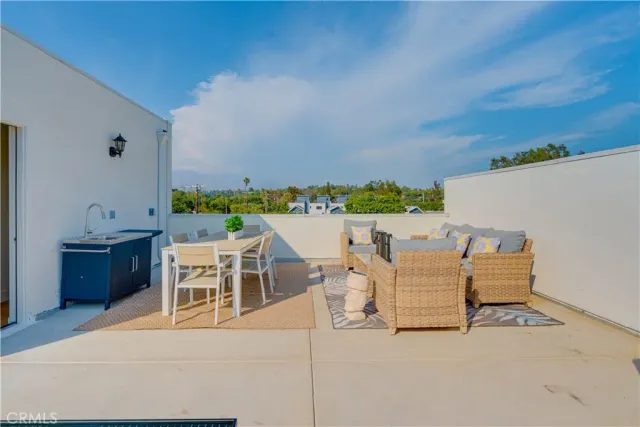 a view of a patio with swimming pool