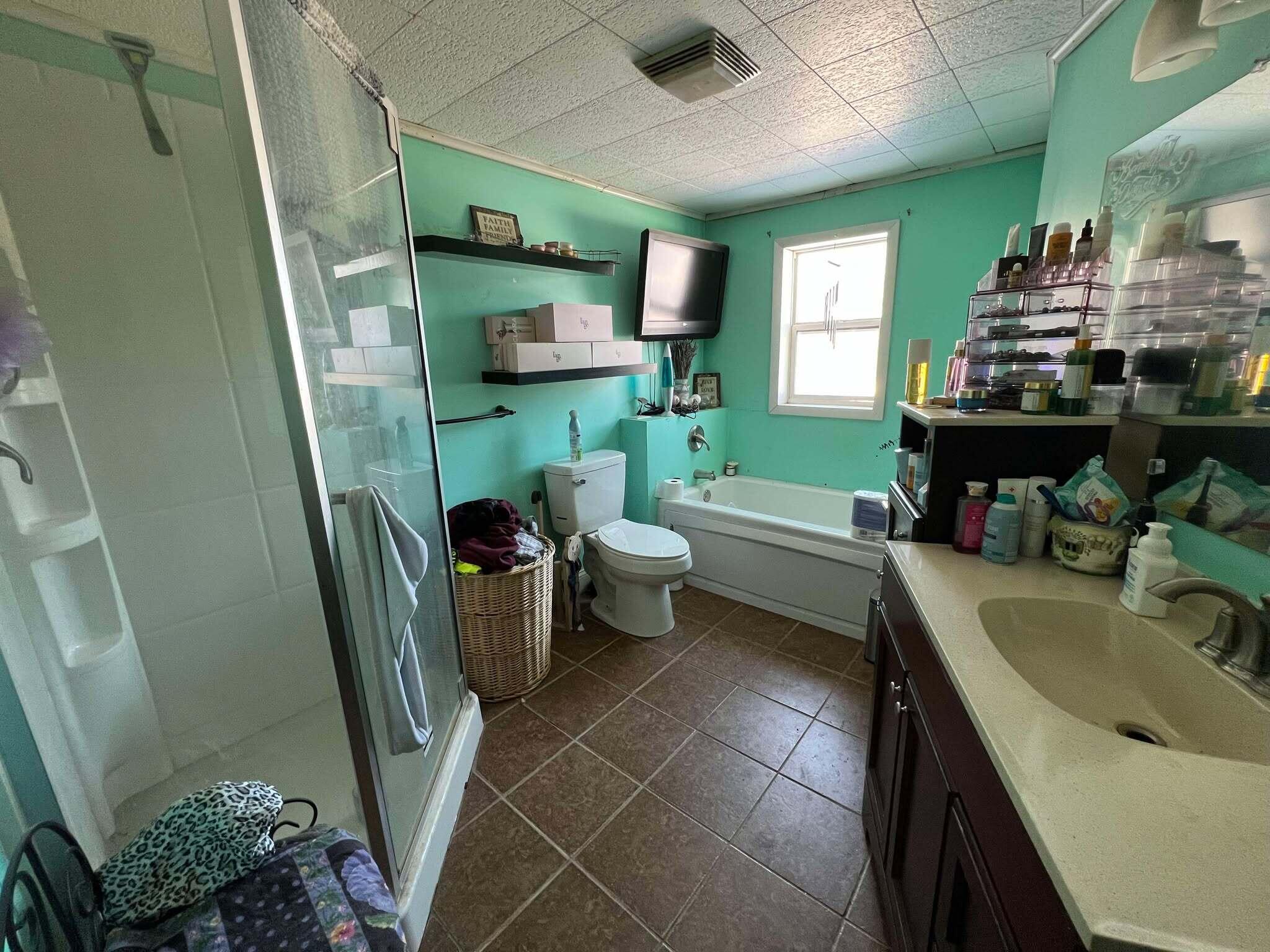 932 Van Buren Road Caswell, ME 04750 - Photo 21 of 49 Primary Bedroom Bathroom