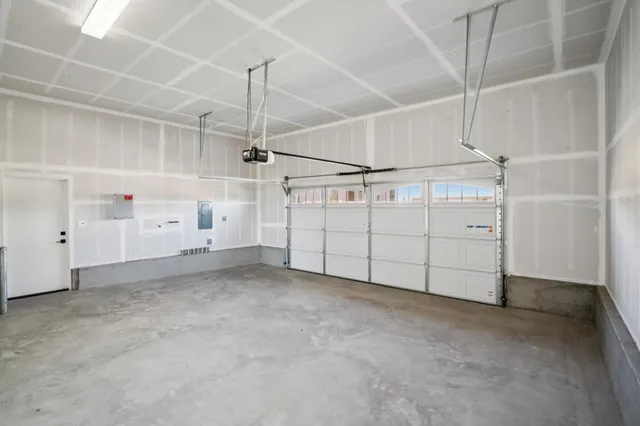 a view of entryway and wooden floor