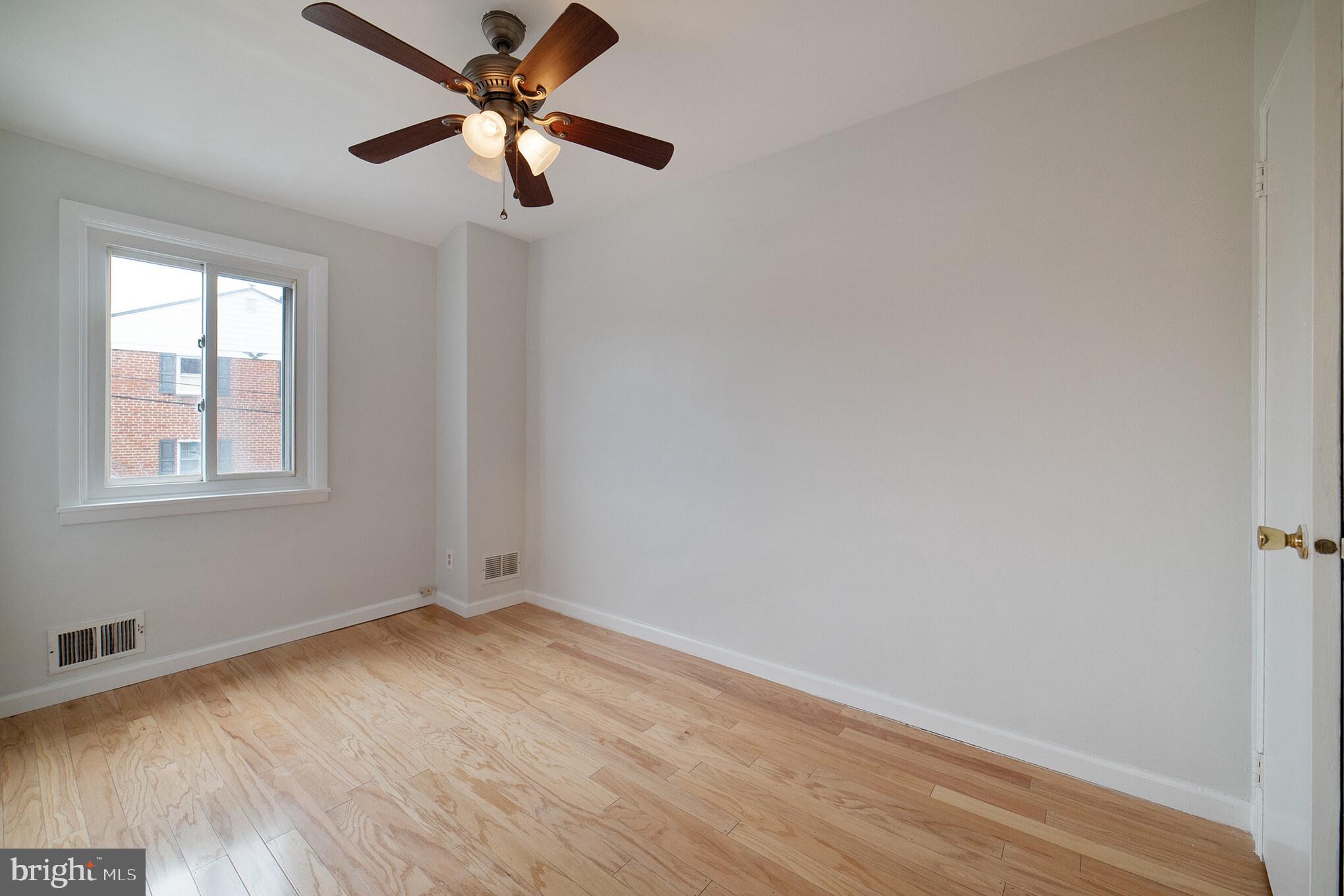 3205 Georgetown Road Baltimore, MD 21230 - Photo 11 of 15 Second bedroom with wood floors
